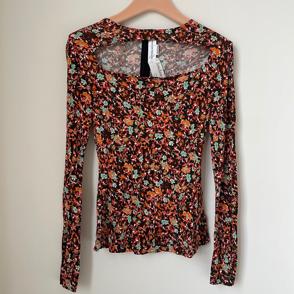 Victoria Beckham cutout detailed top.